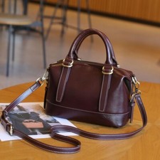 Women's leather cowhide sloping shoulder handbag for travel and shopping