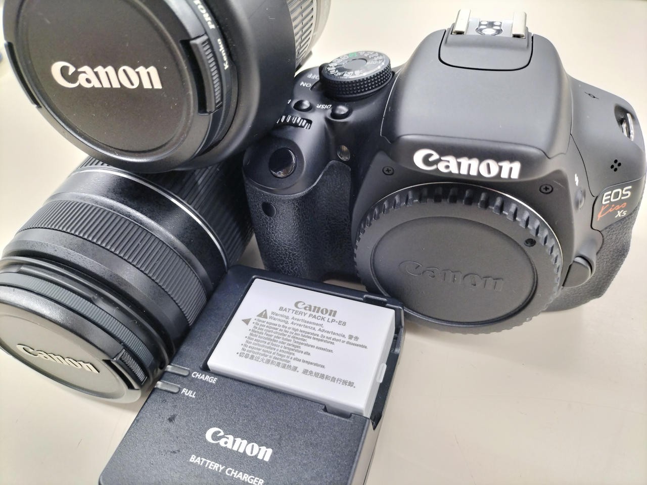 Canon EOS Kiss X5 Digital SLR Camera Double Zoom Kit Used with Battery & Charger