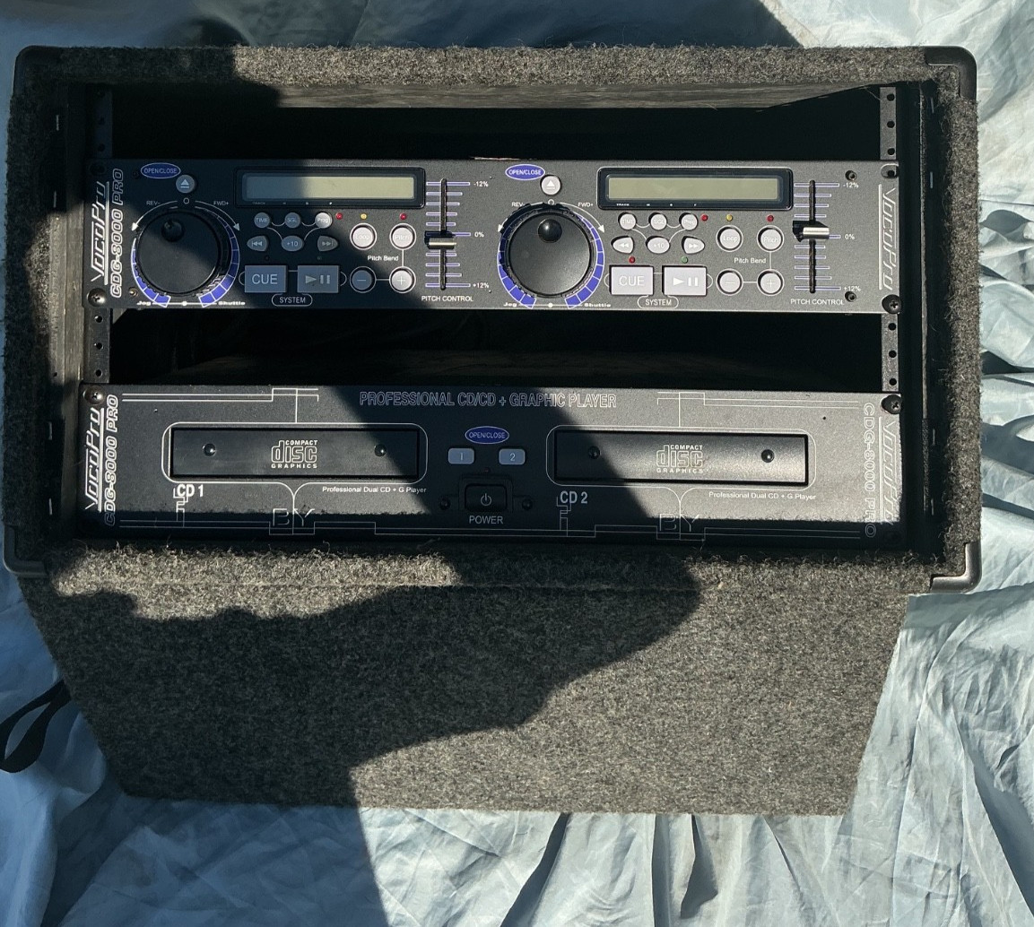 The VocoPro CDG-8000 Pro is a professional rack-mounted dual CD/CD+G player