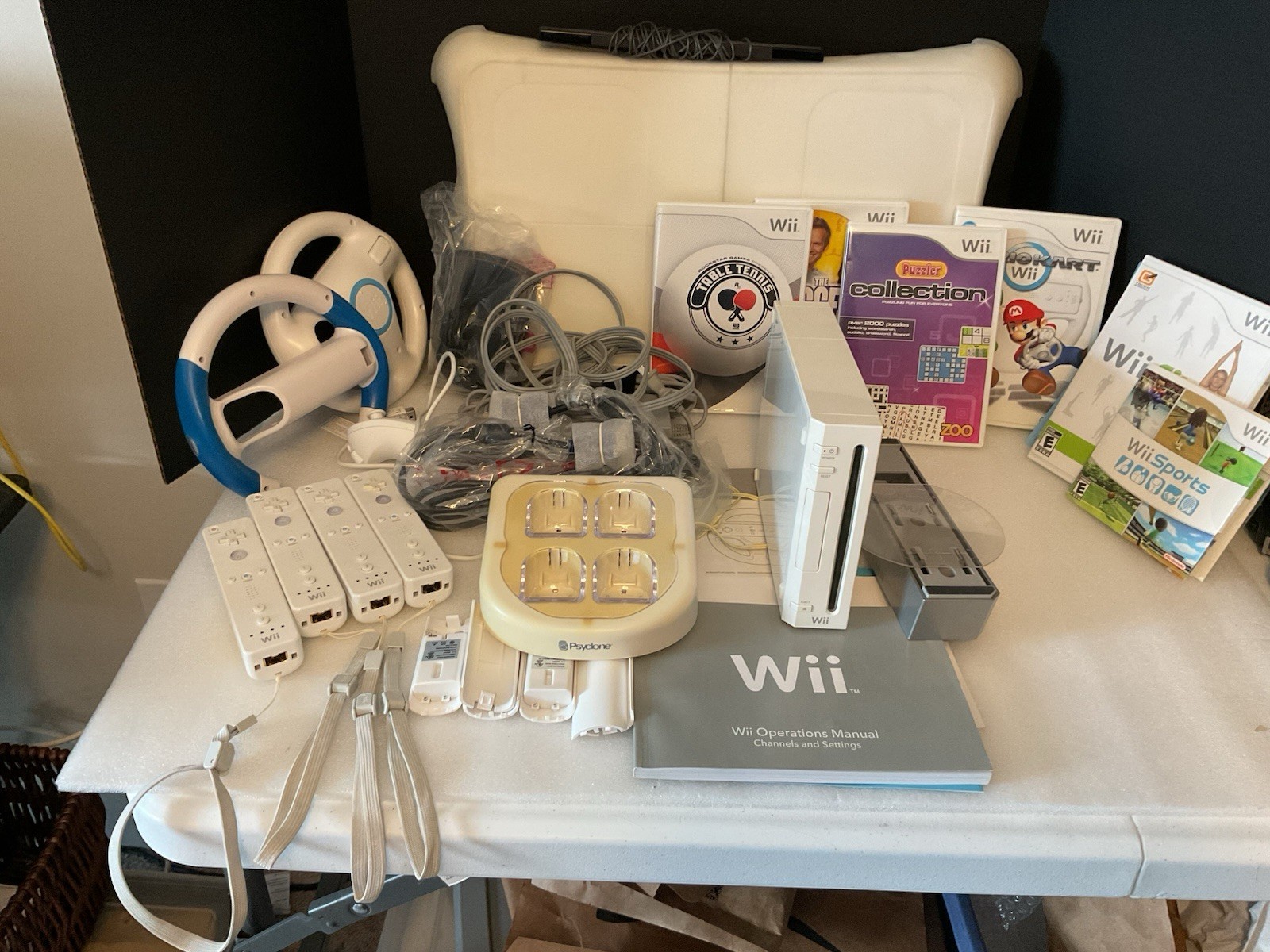 Used -Nintendo Wii Bdl, Lot w/ 4- Controllers, Board, 6 Games, Charger, 2-Wheels