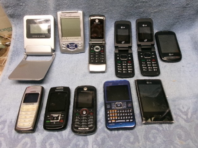 ** VINTAGE - 11 Piece LOT of CELL PHONES - Alarm Clock and Calculators or ??