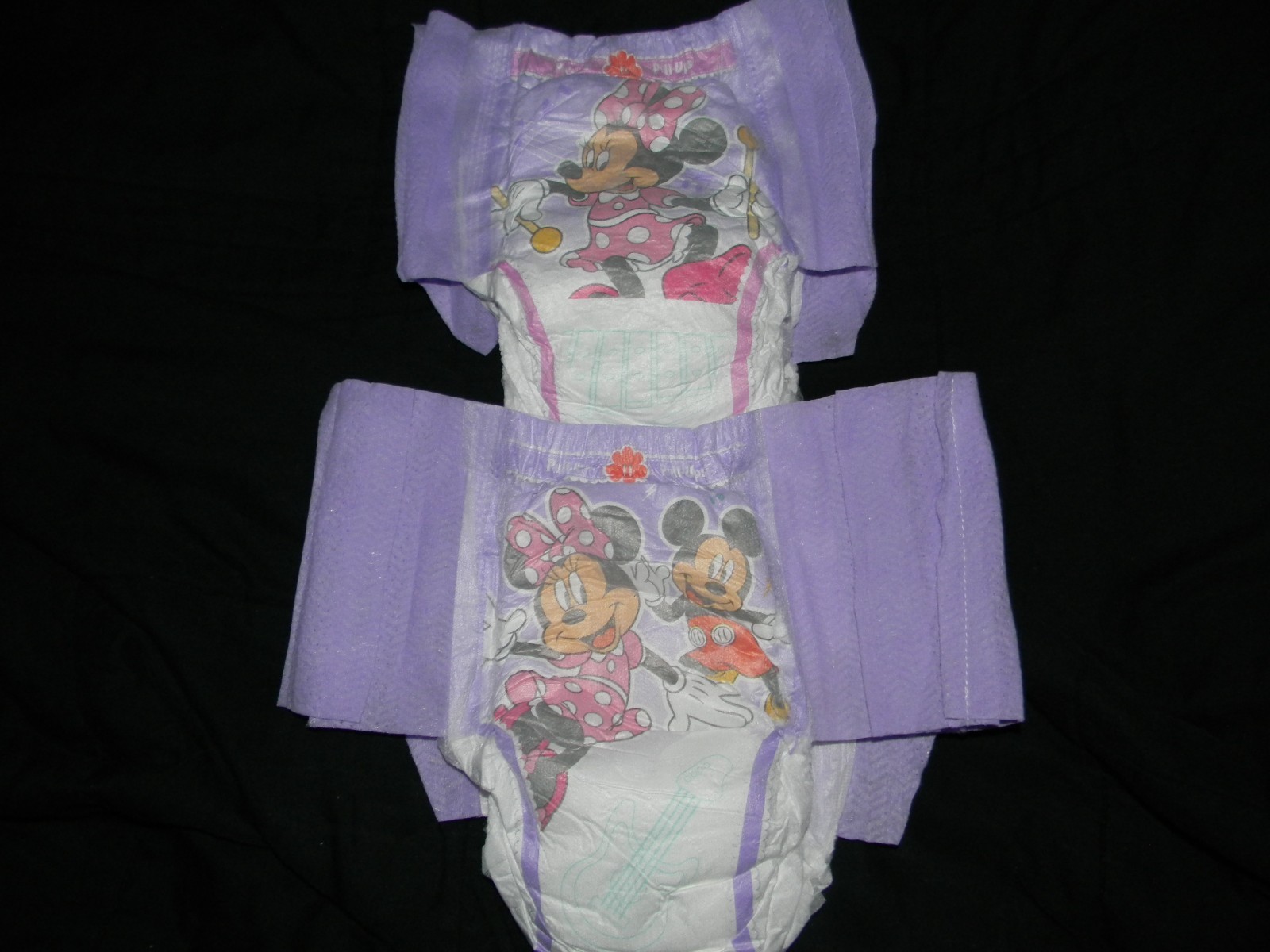 4 Huggies  Pull-ups 4t-5t Size made to fit 32 in waist easy.( Minnie)