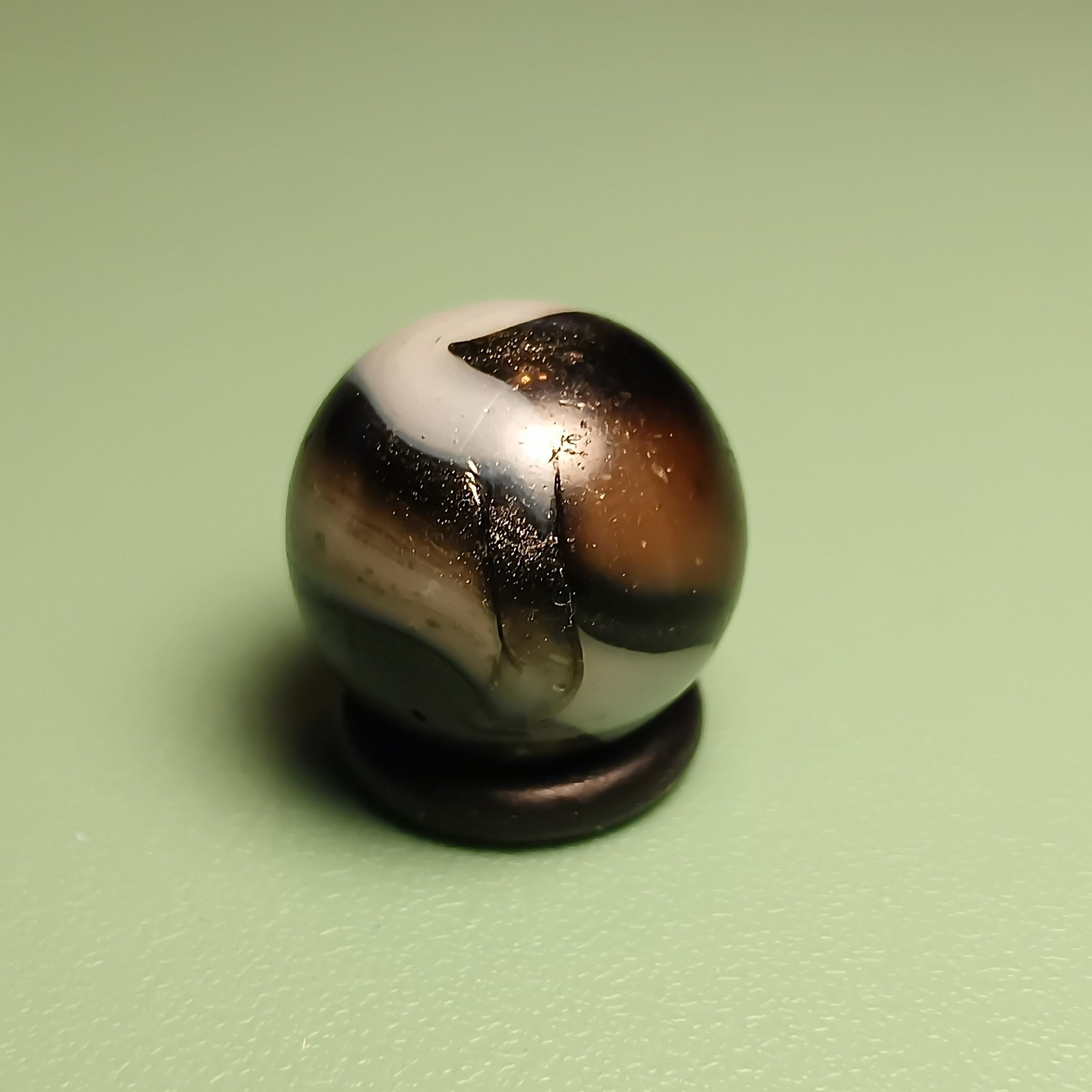 Peltier Bronze Zebra Marble .57 AV