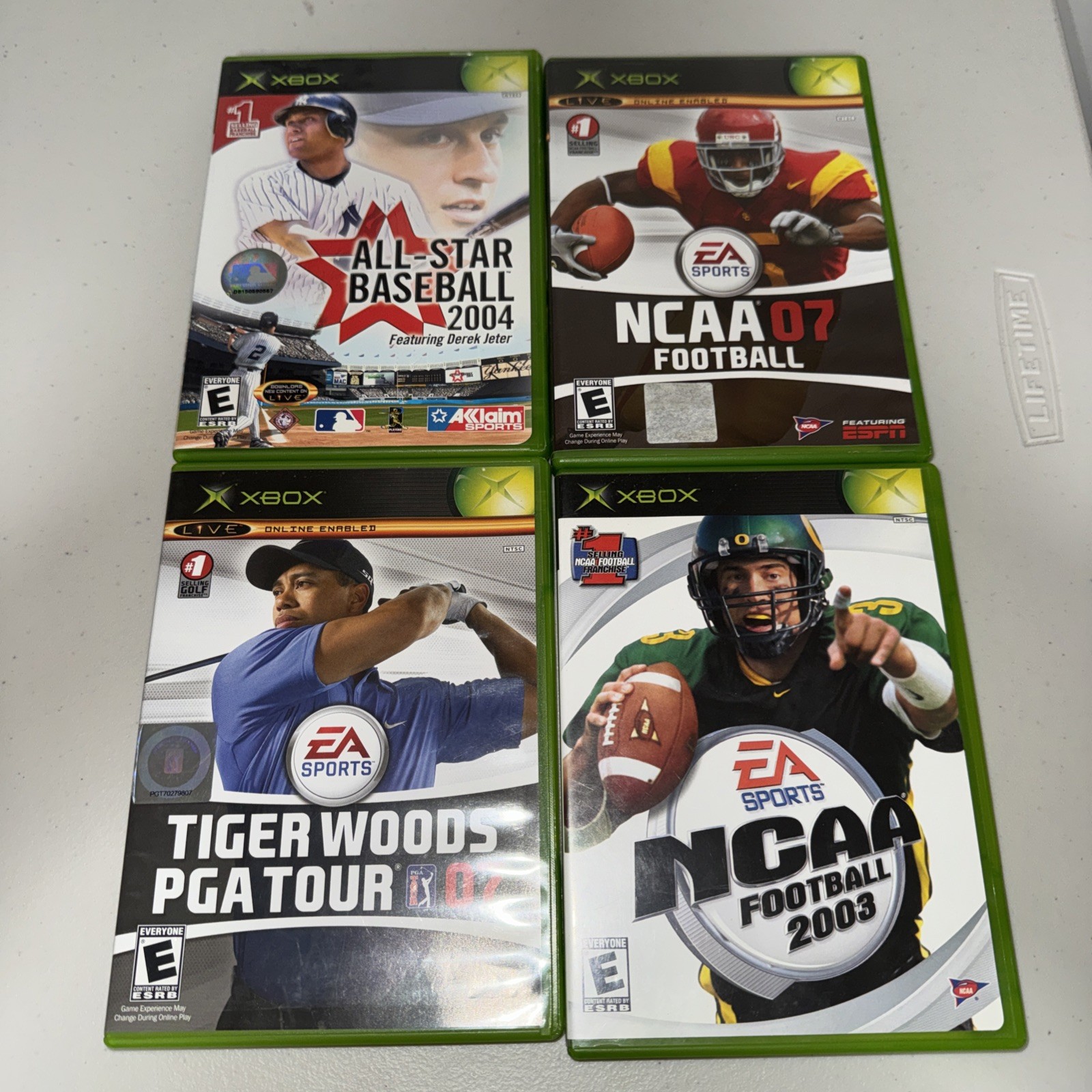 Xbox Lot of 4 games, NCAA Footbal 04 & 07, Allstar baseball 2004, PGA Tour 07