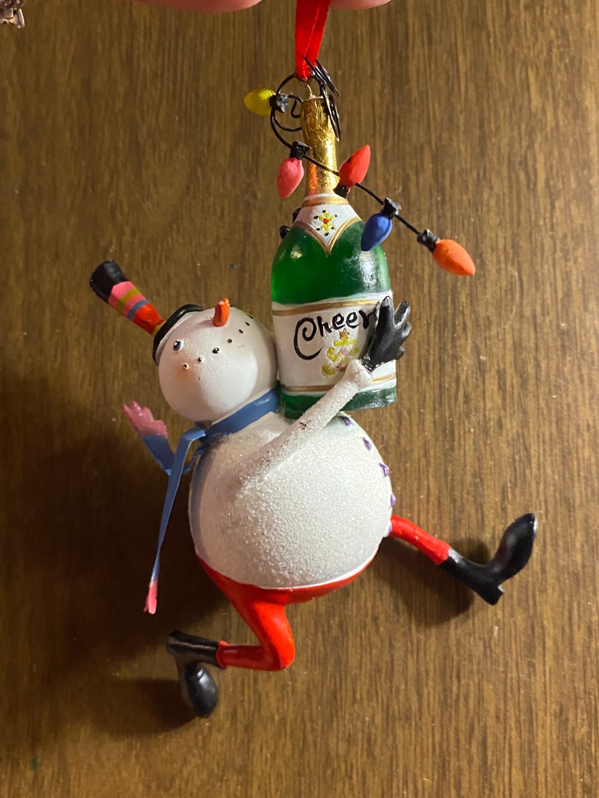 Resin whimsical Snowman w Champagne Bottle Christmas Ornament 5.5"