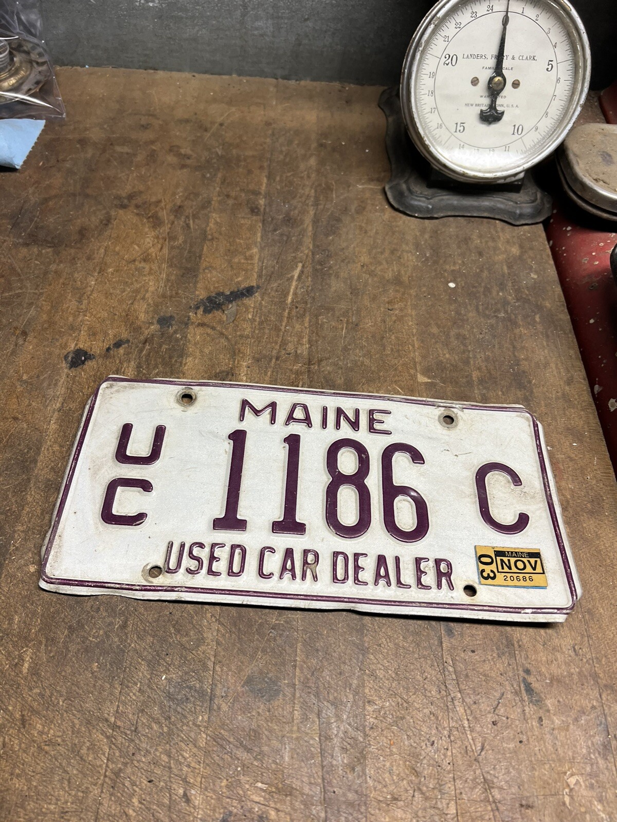 Vintage Original Used Car Dealer UC 1186C Maine ME License Number Plate Tag USA