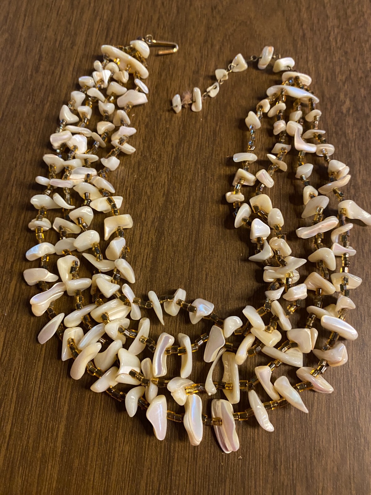 Vintage Genuine Polished Shell Four Strand Necklace Gold Tone 14"-16"