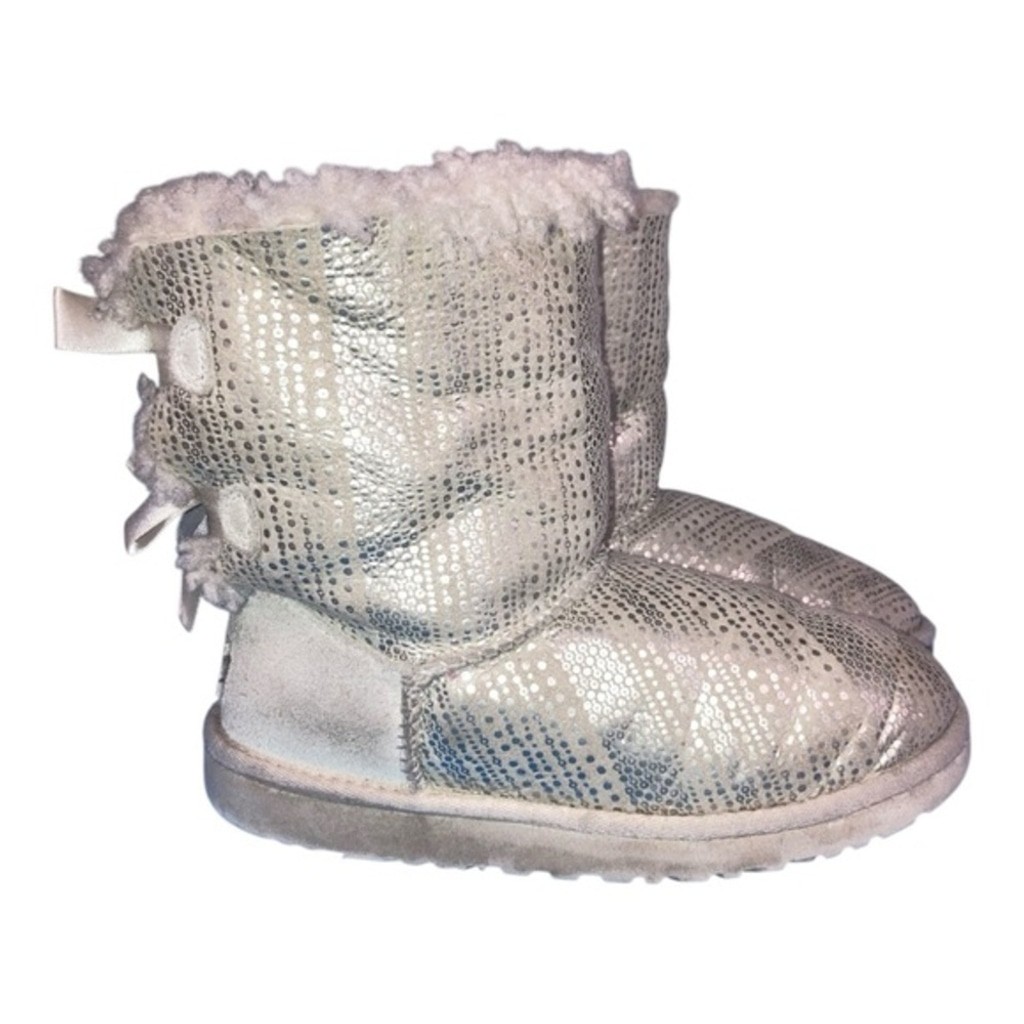 UGG Bailey Bow Bling boots in a light color boots are adorned with silky bows