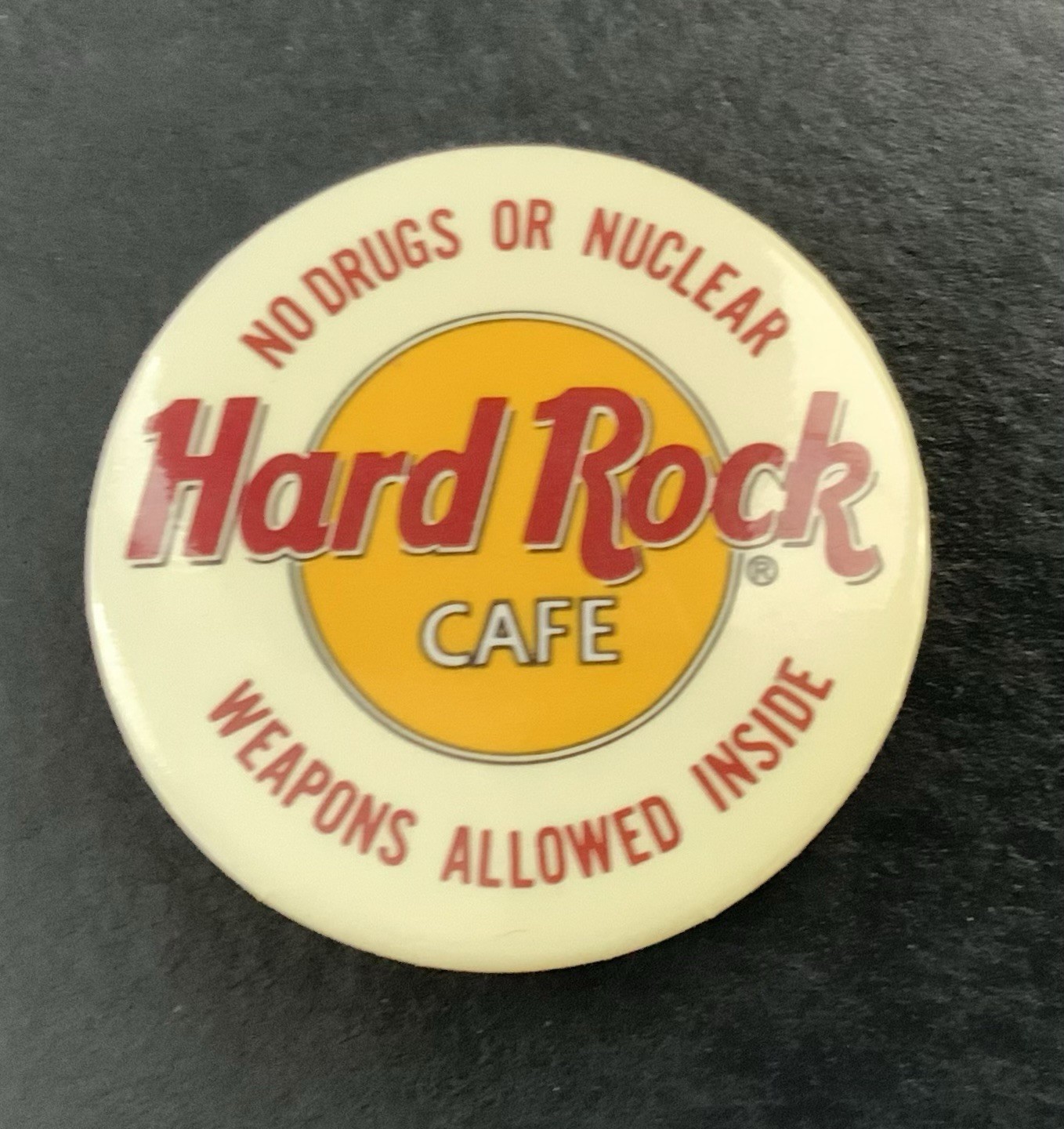 VINTAGE HARD ROCK CAFE NO DRUGS OR NUCLEAR WEAPONS ALLOWED INSIDE PINBACK BUTTON