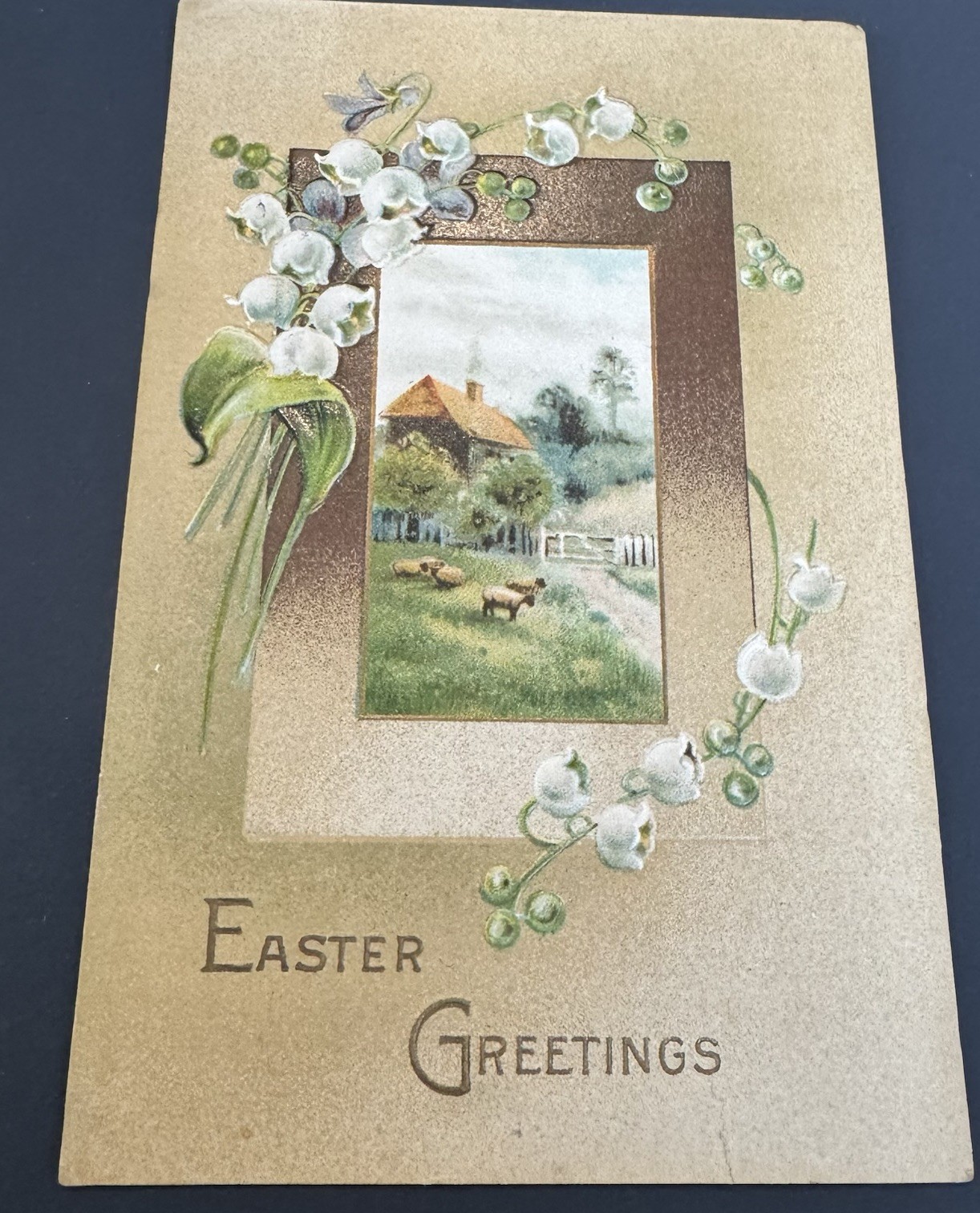 Vintage Easter Greetings Postcard Pastoral Sheep Cottage Lily of The Valley Emb