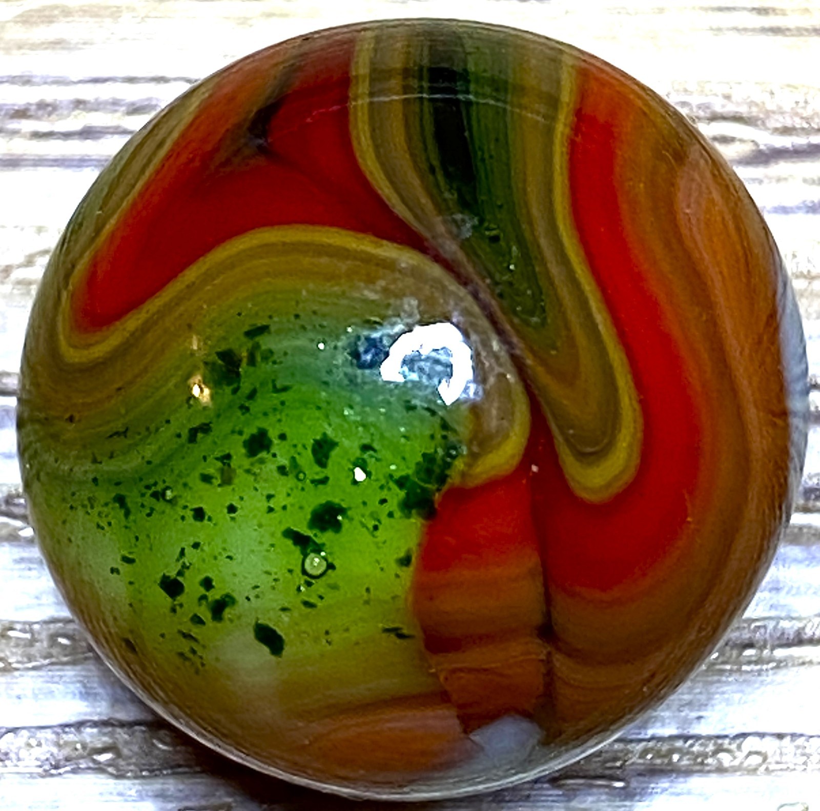 DAS/JABO CANDY APPLE OXBLOOD AND AVENTURINE SWIRLED SHOOTER .74" BOX03/369