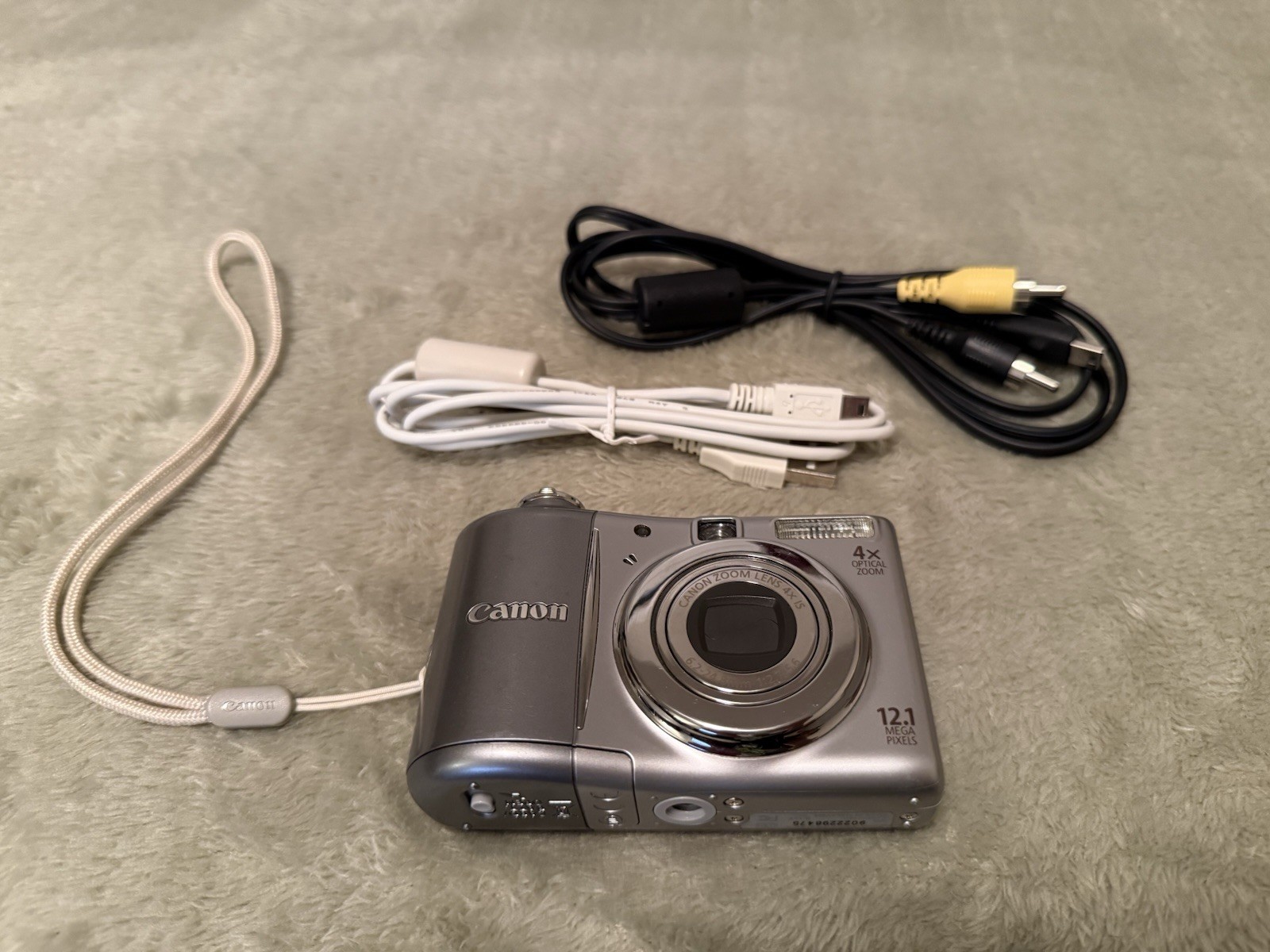 Canon PowerShot A1100 IS Digital Camera with cables