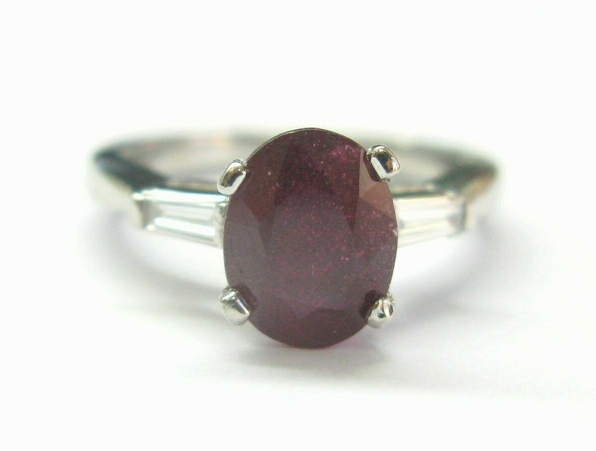 Platinum Oval Ruby & Baguette Diamond Three-Stone Ring 3.06Ct