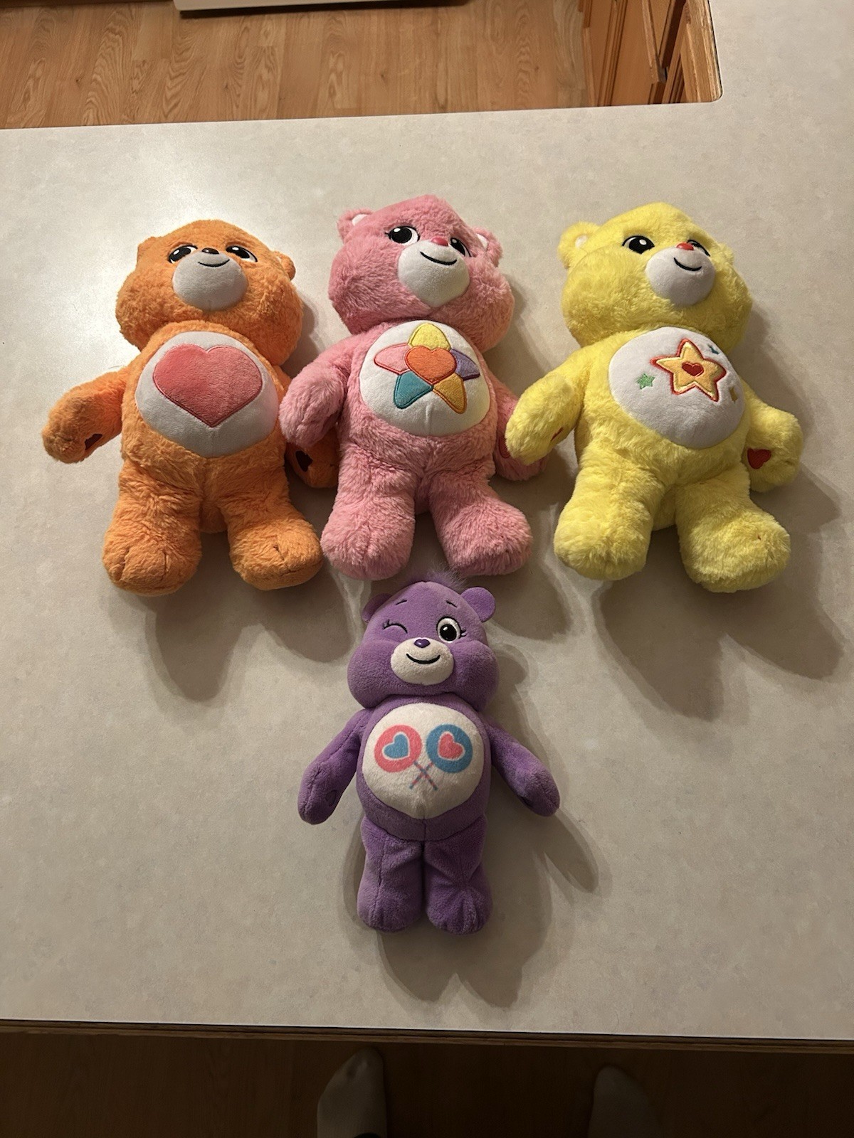 4 Care Bears Plush Lot Orange, Pink, Yellow, Purple