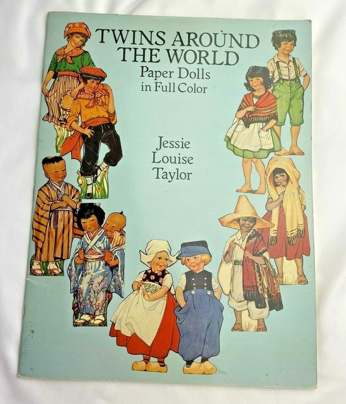 Twins Around The World Paper DollsJessie Louise Taylor Full Color Dover 1989