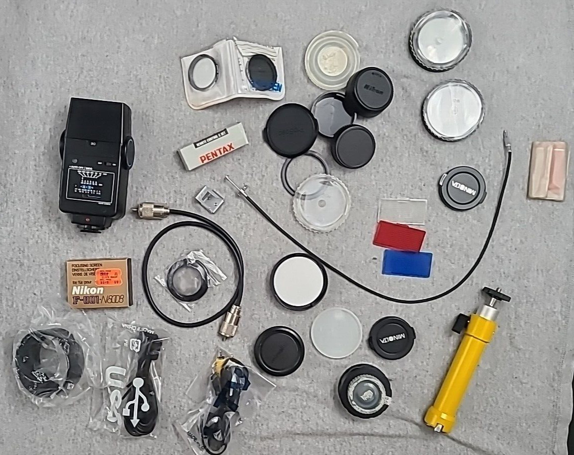 Lot of assorted camera accessories, cables, more