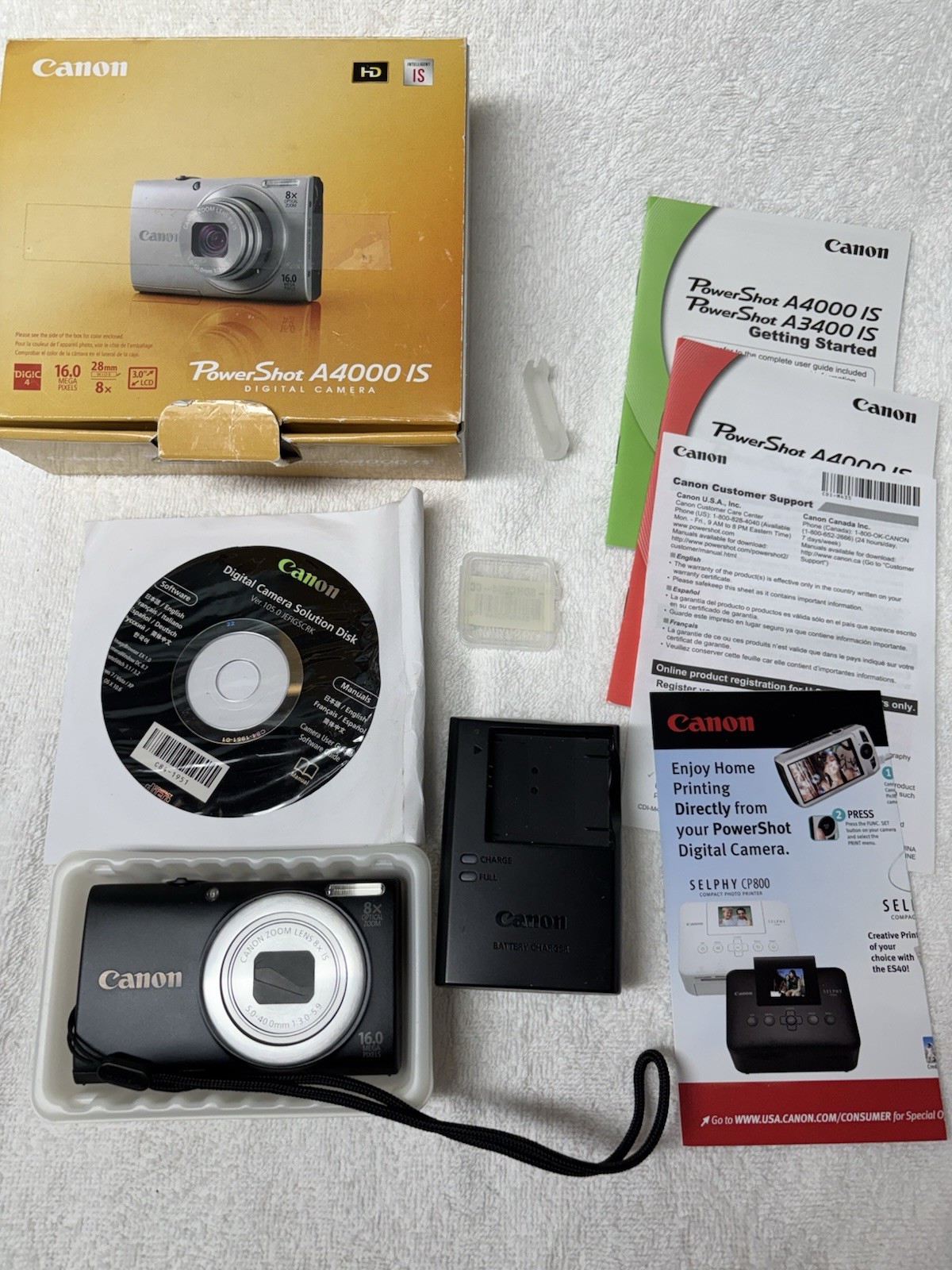 Canon PowerShot A4000 IS Digital Camera Black 16.0 MP w/ Accessories - Works!