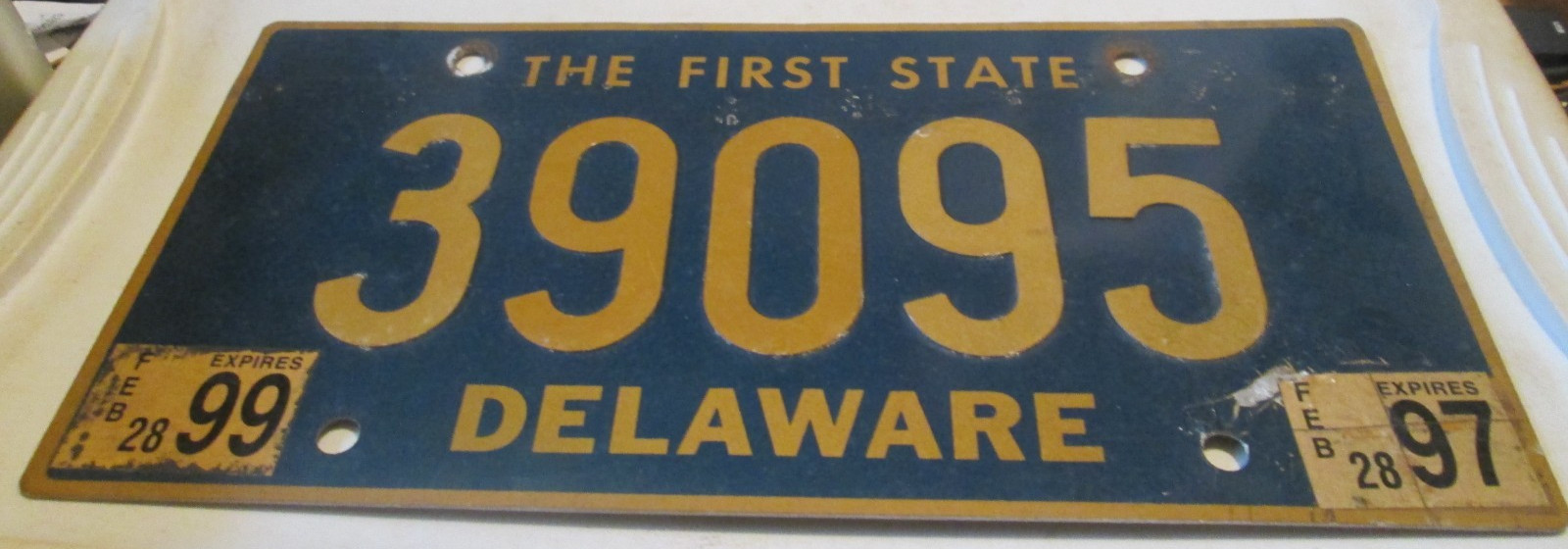 VTG US STATE OF Delaware 1999 riveted numbers license plate 39095 MANY STICKERS