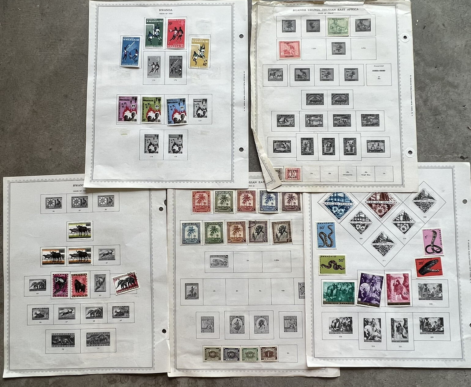 RWANDA STAMPS ON ALBUM PAGES PALM TREES, CONGO OVERPRINTS, UNESCO, SNAKES ETC.