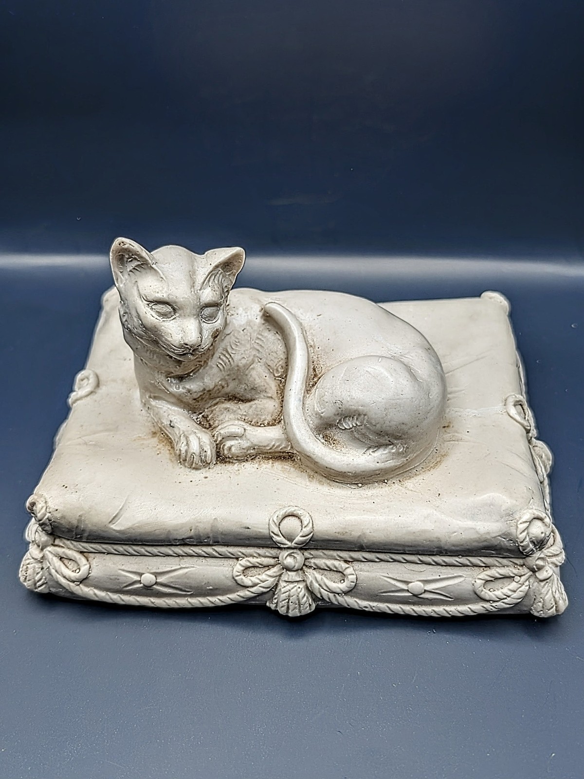 Decorative Sculpture Of A Lying Cat, crafted From Fine Sandstone  Or Alabaster