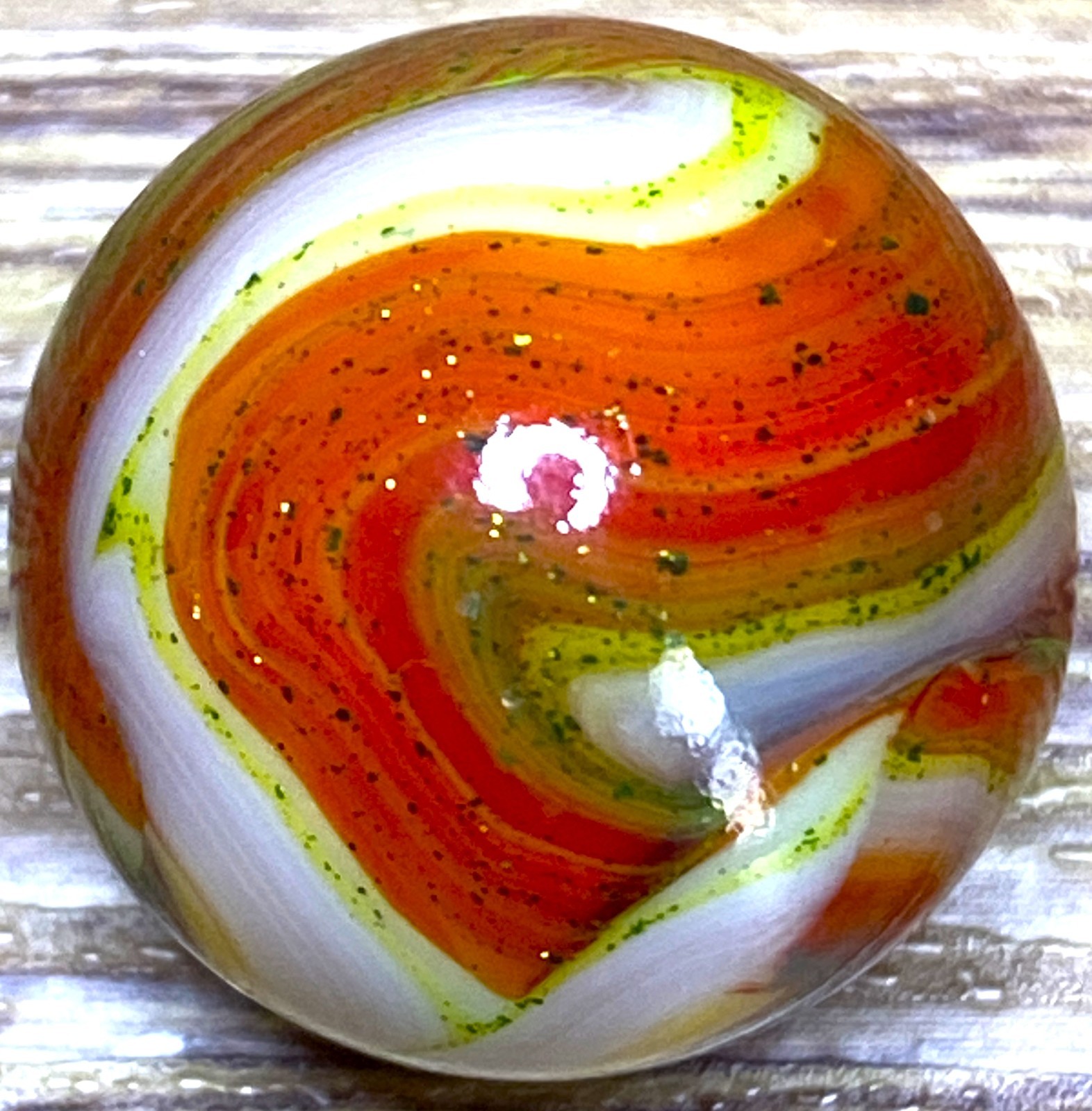 DAS/JABO ATTRACTIVE COLORS / OXBLOOD & AVENTURIN SWIRLED SHOOTER .70" BOX03/374