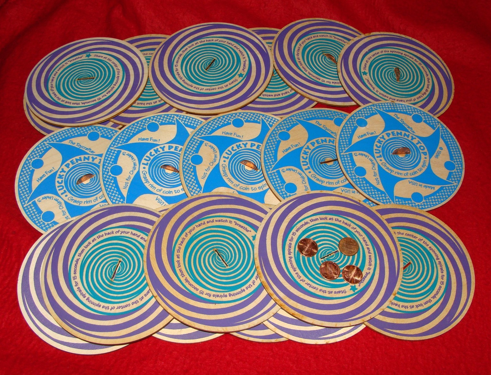 Lot of 25 Toycrafter Hypnotic Lucky Penny Toy Spinning Tops 10 w/ Original Penny