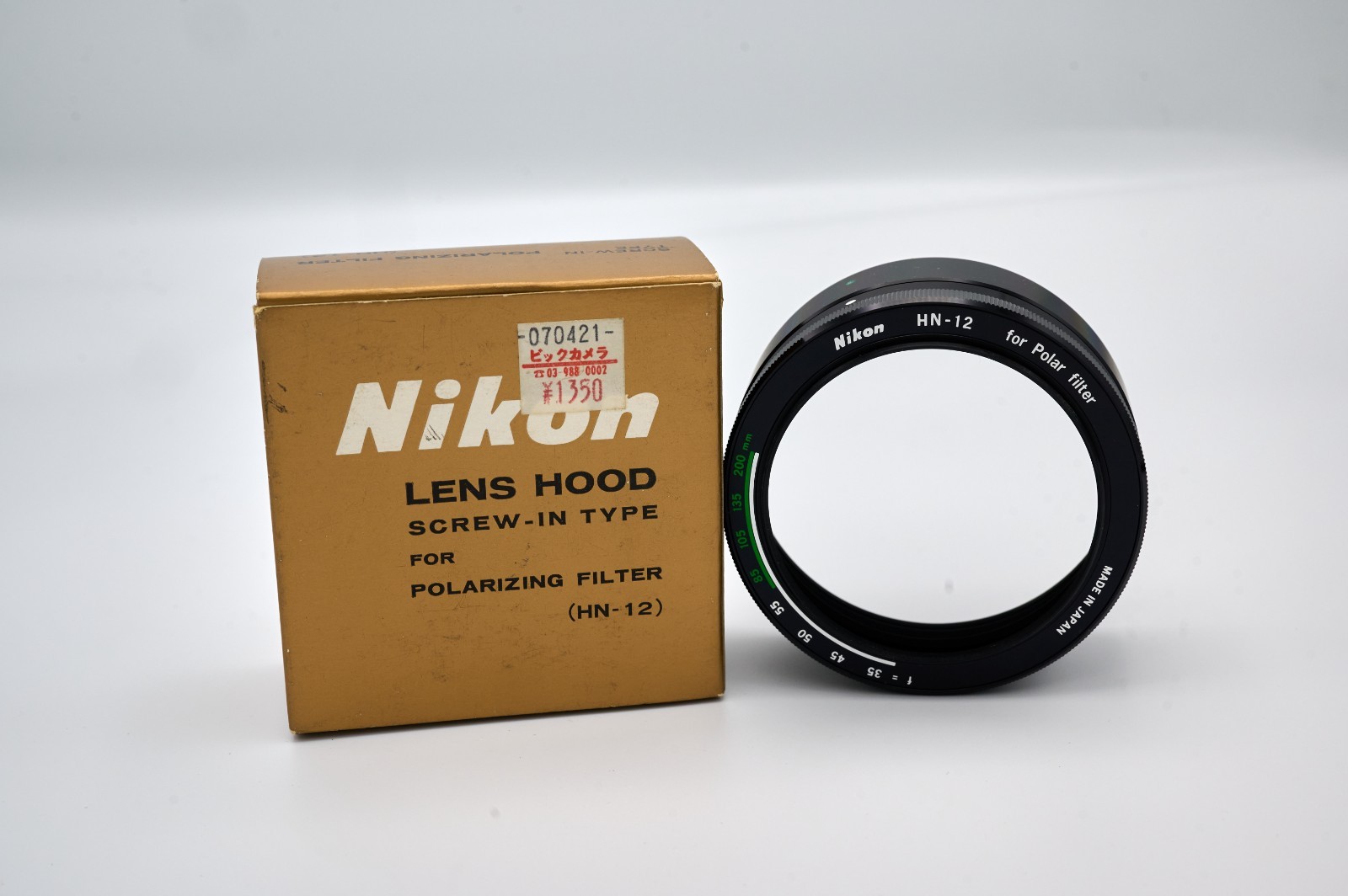 Nikon HN-12 screw-in lens hood, New in the original box