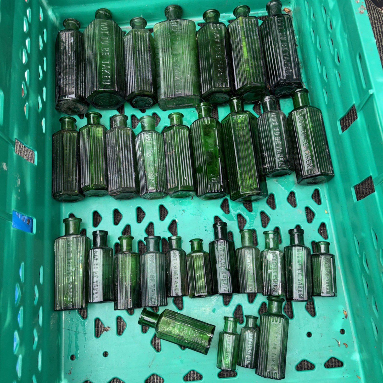 Job lot green poison bottles 