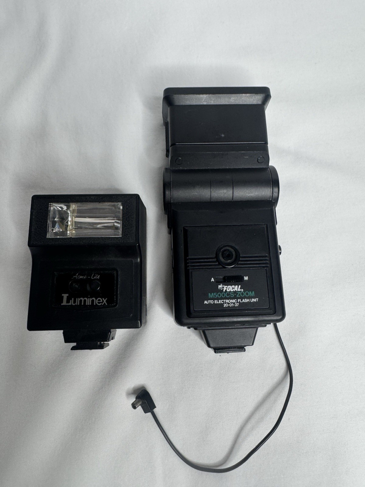 Lot of 2 Camera Flashes Luminex Acme- Lite & Focal M500CS- Zoom (Working)