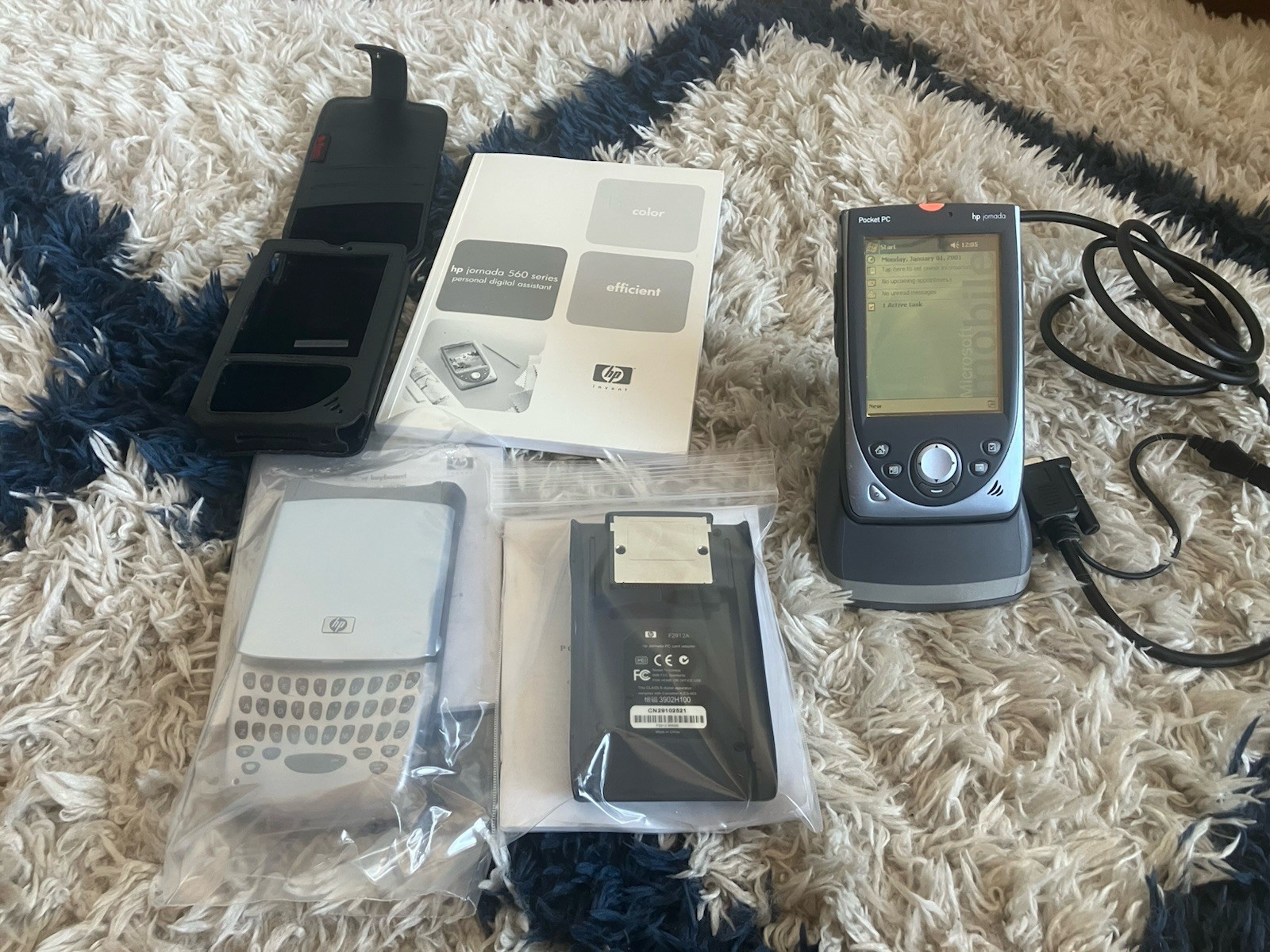 HP Jornada 560 Series PDA with Pocket Keyboard and PC Card Adapter