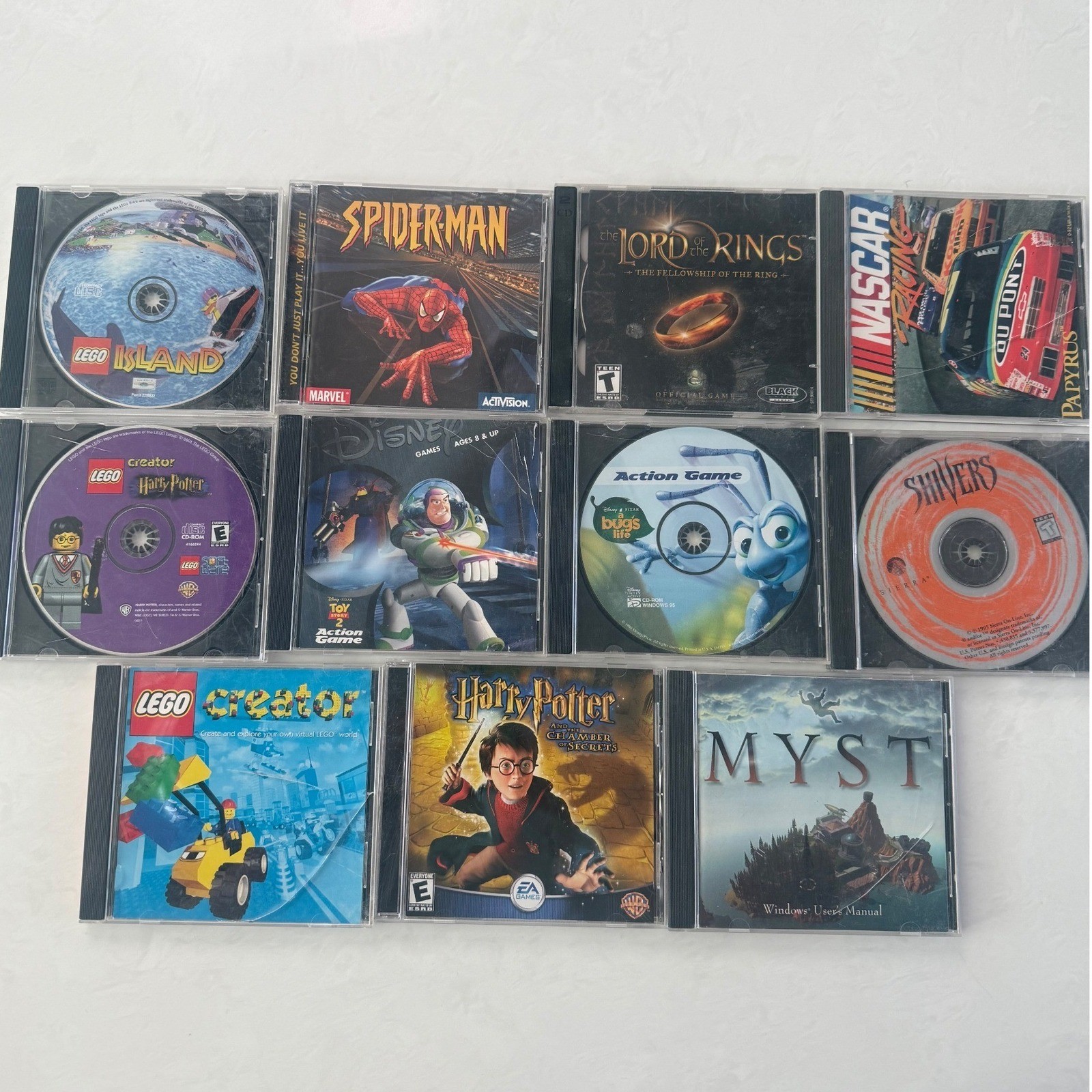 Vintage PC CD ROM Game Lot LEGO Harry Potter Spiderman Myst LOTR NASCAR Untested