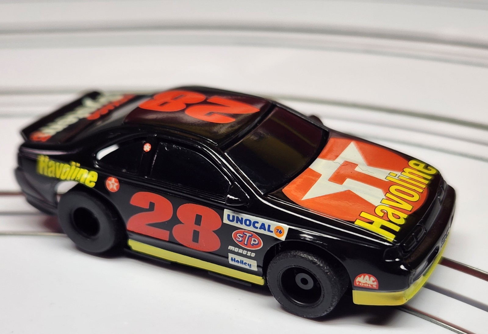 Halvoline #28 TYCO 440x2 Wide chassis Slot Car , Runs (H2)