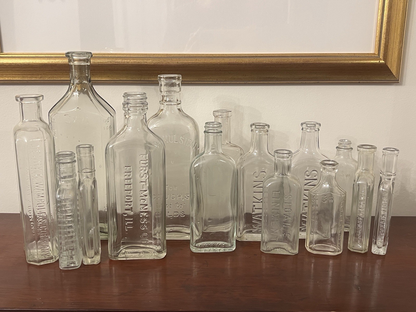 Lot 15 Antique Clear Glass Medicine Bottles Watkins Sloan McNess 5 to 9 in