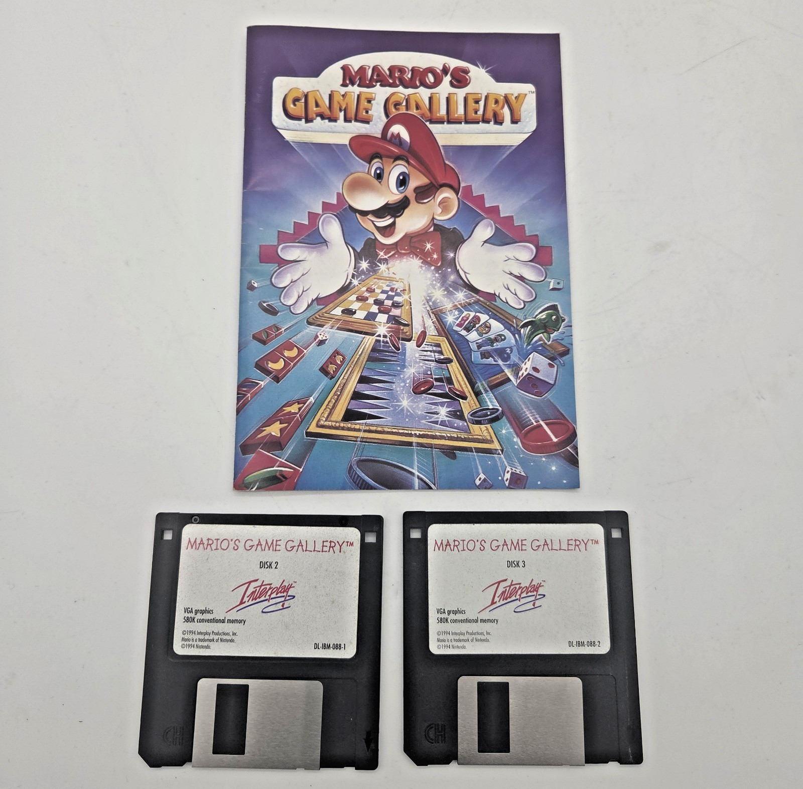 Marios Game Gallery Interplay Floppy Disks And Manual (Disks 2 & 3 Only)